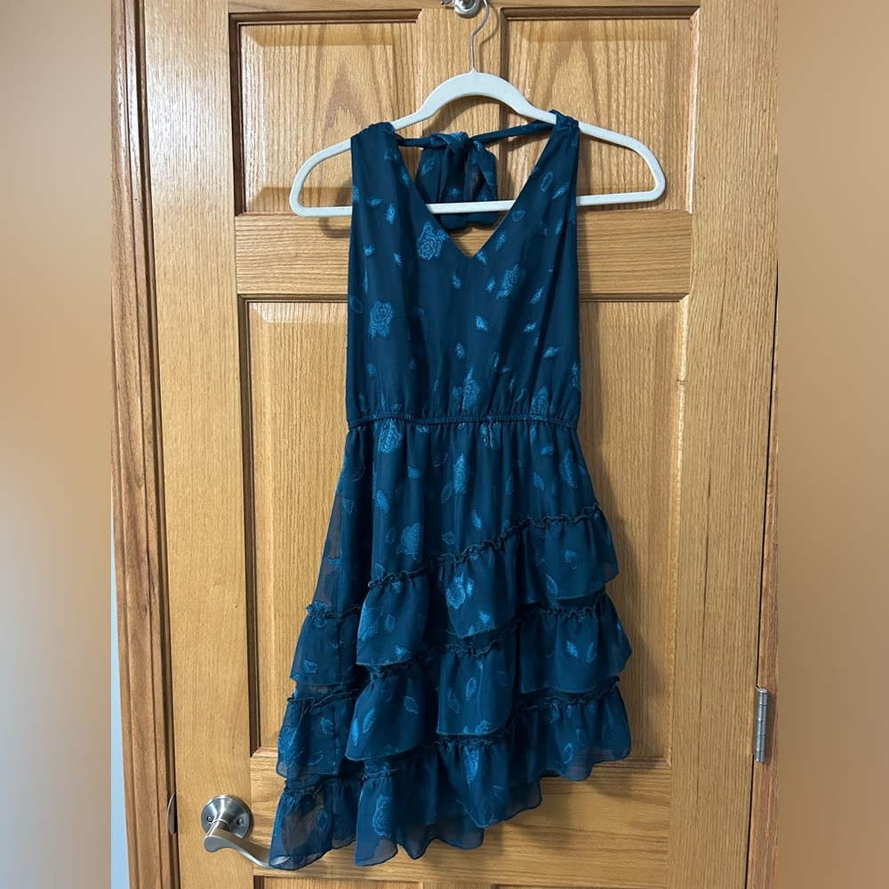 teal dress with slanted bottom